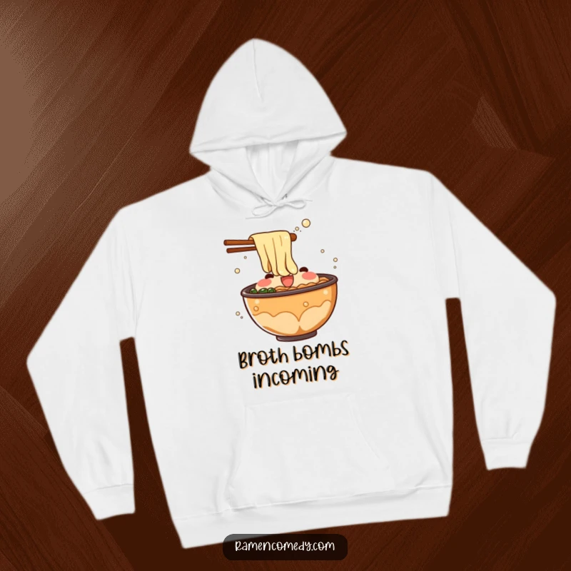 Funny ramen broth hoodie with a bubbling liquid character creating a surprising splash, ideal for staying warm and stylish.