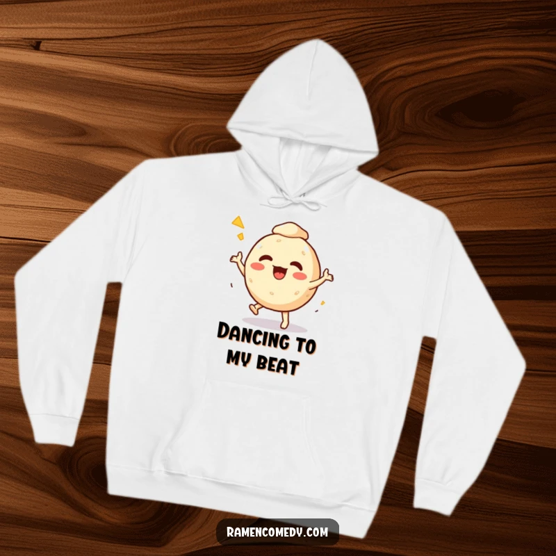 Funny Hoodie featuring an excited takoyaki ball character caught in a fun, energetic dance, perfect for staying warm and cheerful.