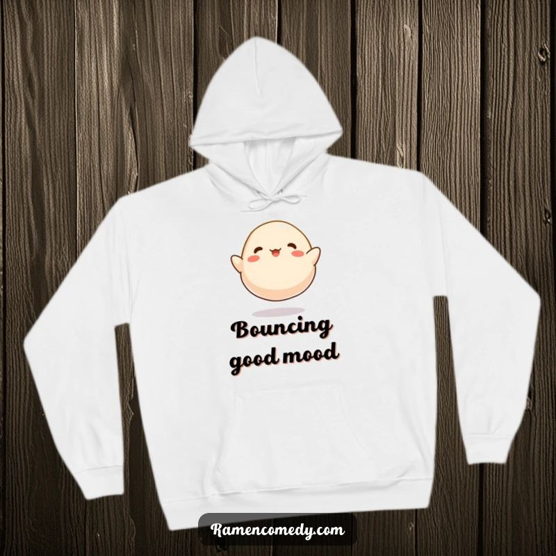 Funny Dumpling Bounce Hoodie, a cartoonish dumpling happily bouncing like a tiny ball, for cozy, cheerful wear.