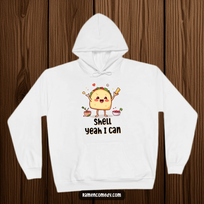 Funny hoodie depicting a taco with legs skillfully juggling its fillings, capturing a moment of delicious chaos.