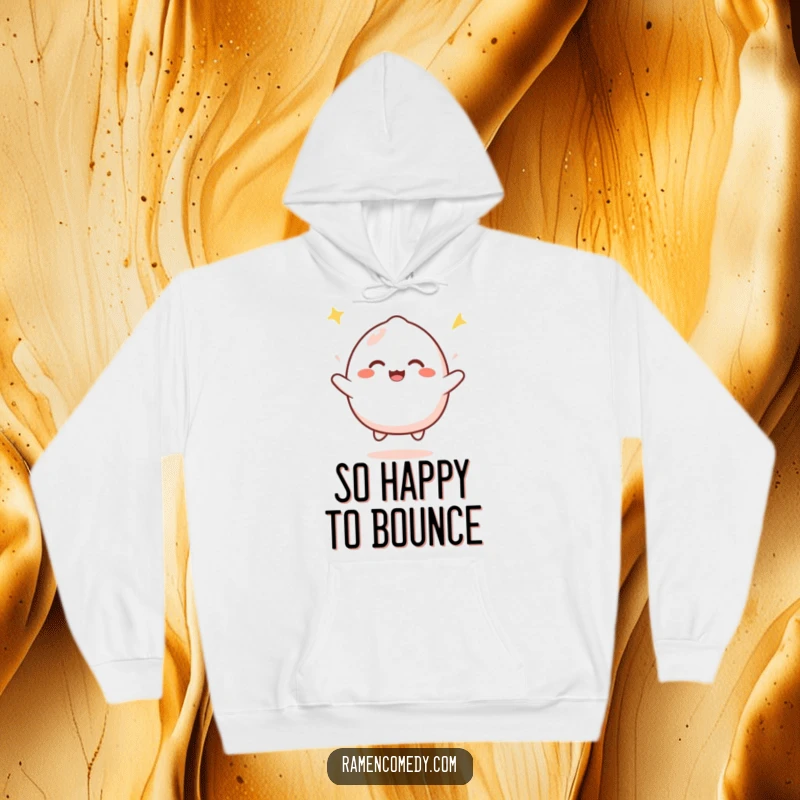 Funny mochi bounce hoodie with a cute mochi character happily bouncing with infectious joy, perfect for staying warm and cheerful.