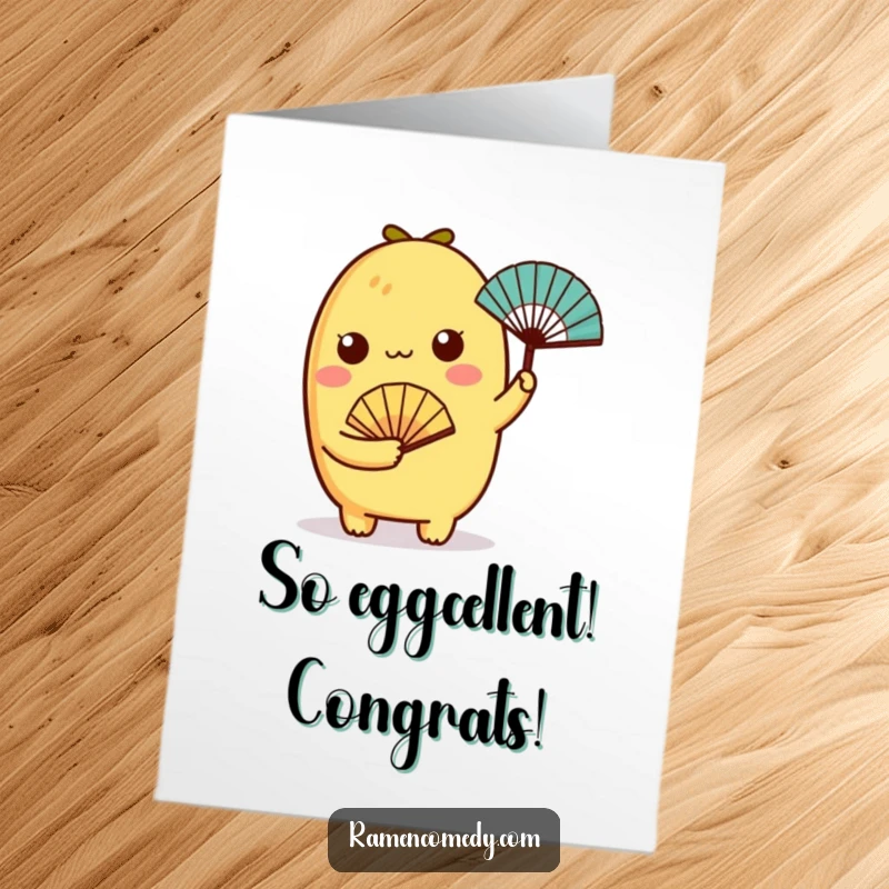 Funny Free Printable Congratulations Card: A charming tamagoyaki character holding a tiny fan, celebrating success with cool, breezy vibes.